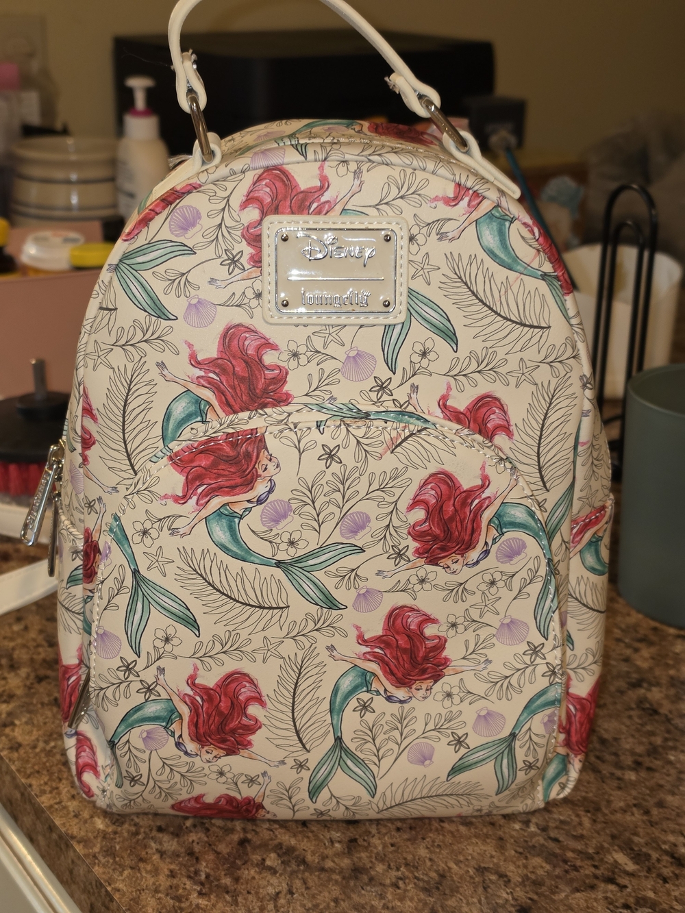 Loungefly X Disney Cream Backpack with Ariel Floral Print